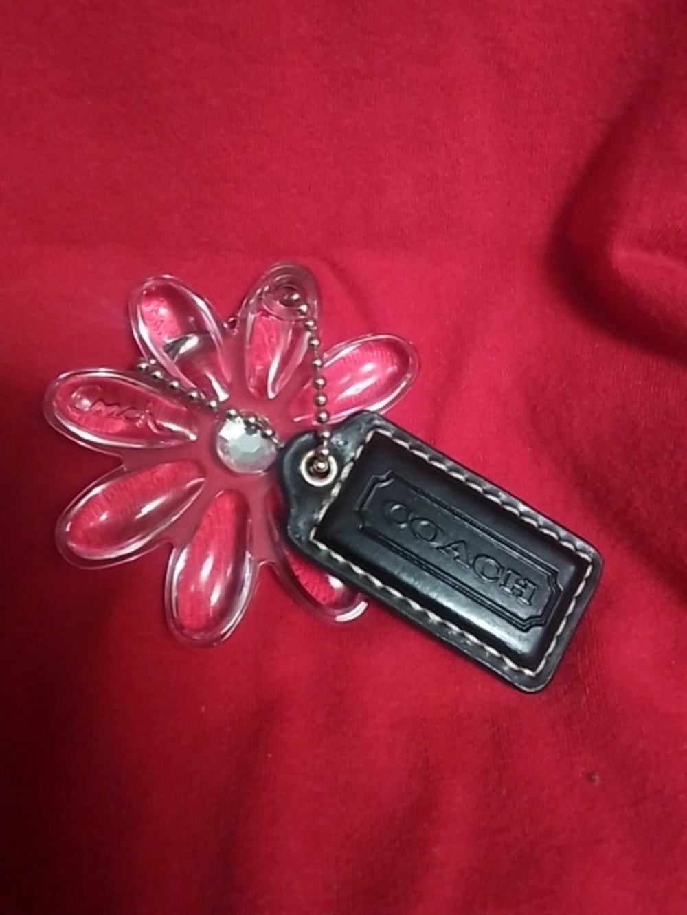 COACH Clear Pink Hue Poppy Flower Charm with Black Leather Logo Tag